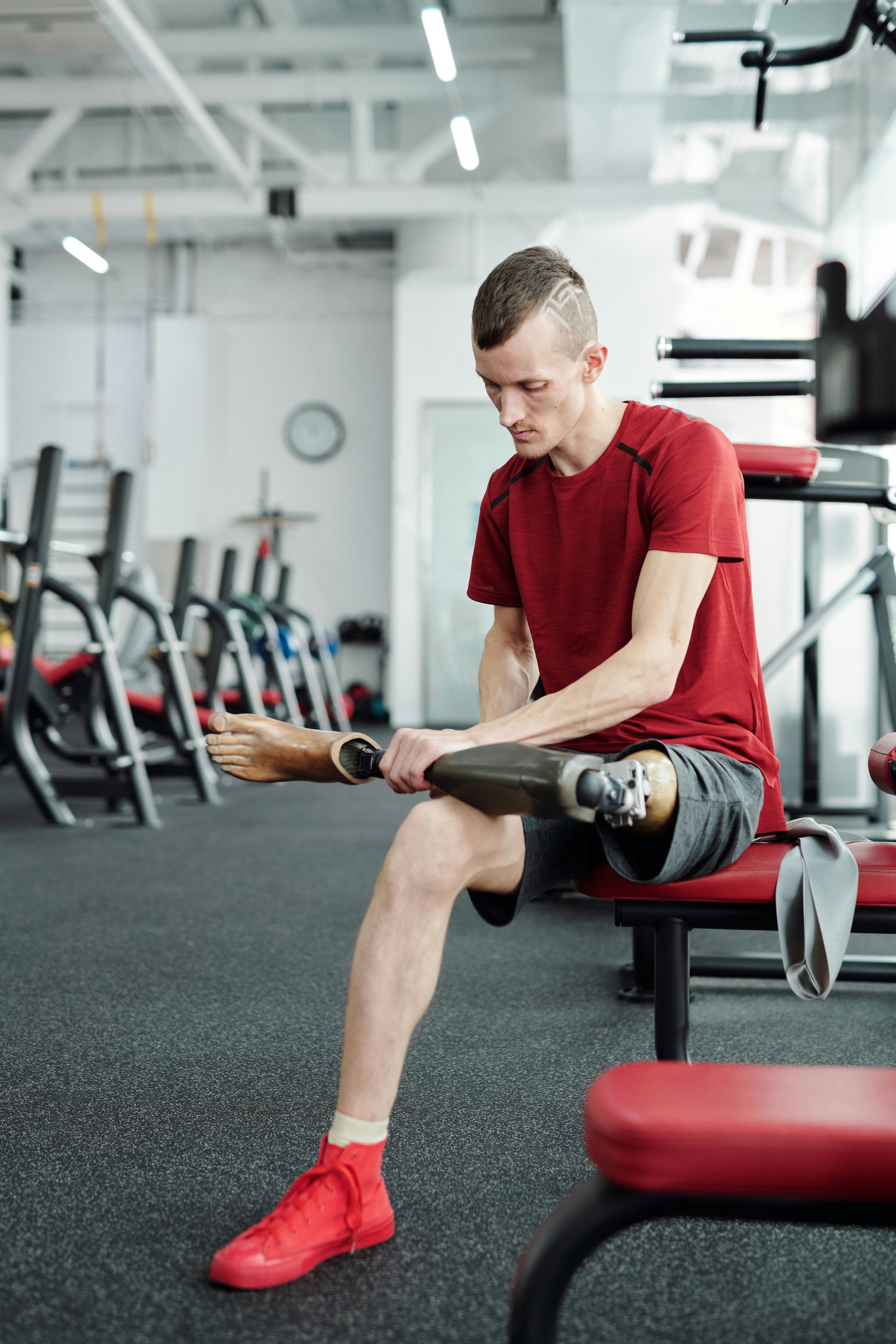 A man and woman in red workout clothes · Free Stock Photo