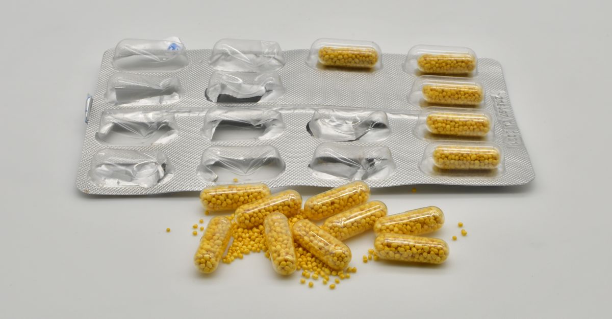 Yellow capsules on silver foil