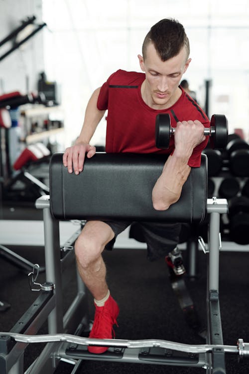 Photo Of Man Lifting Dumbell