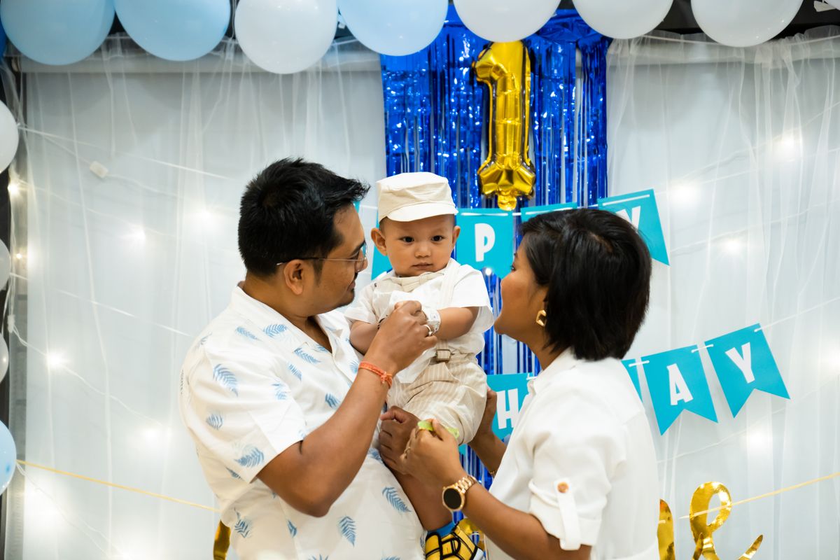Family celebrating a first birthday
