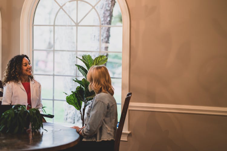 Two Women Talking Together 