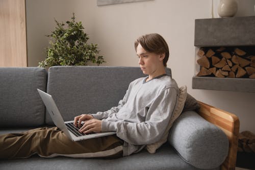 Photo Of Man Using Laptop