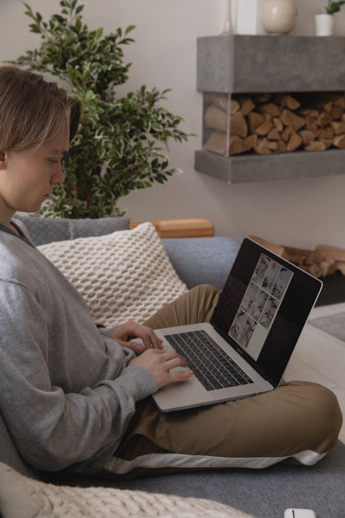 Photo Of Man Using Laptop