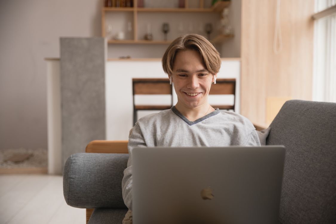 Photo Of Man Using Laptop · Free Stock Photo