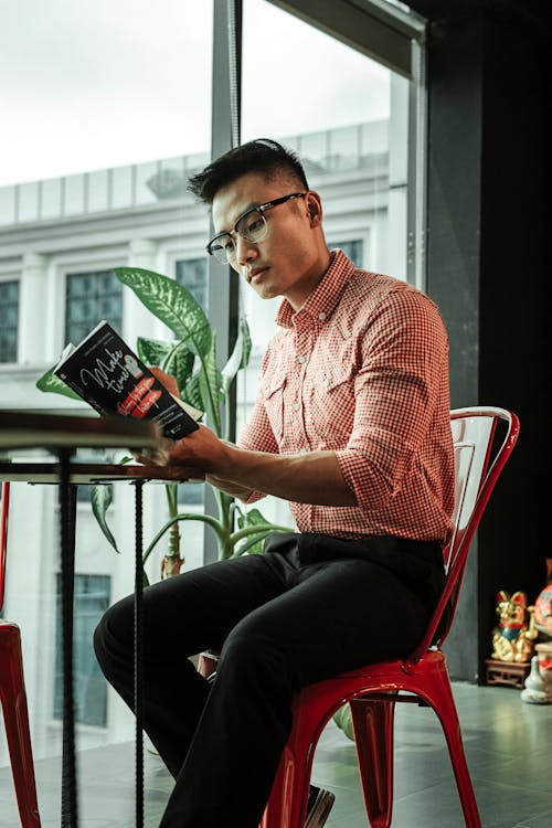 Free Photo Of Man Reading Book  Stock Photo