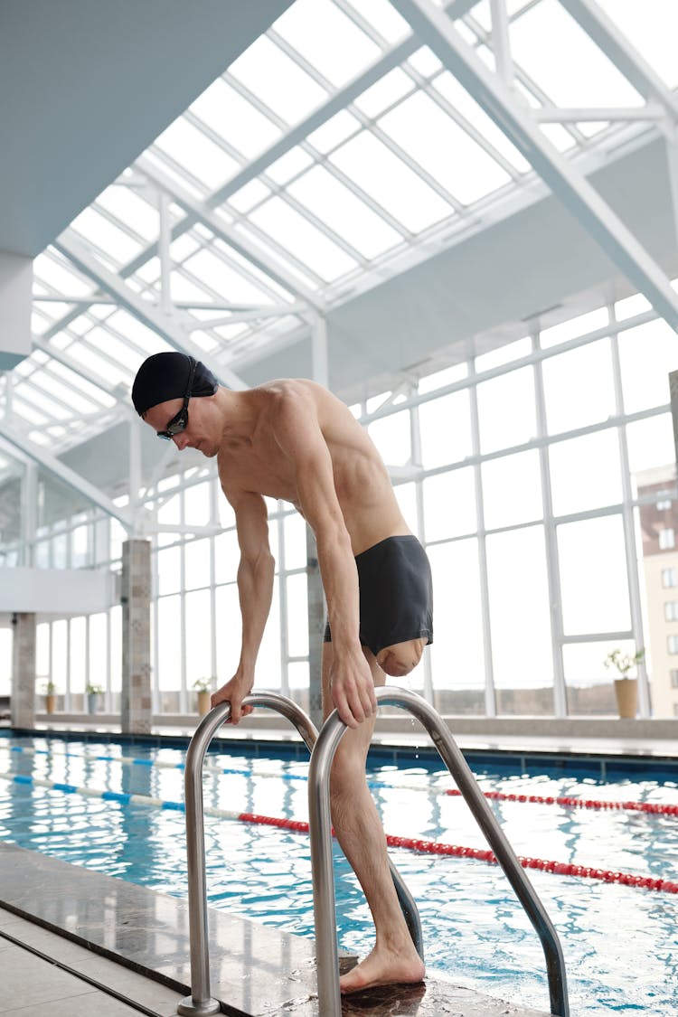 Photo Of Man Beside Pool 