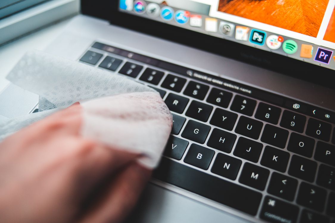 Cleaning a laptop to improve airflow