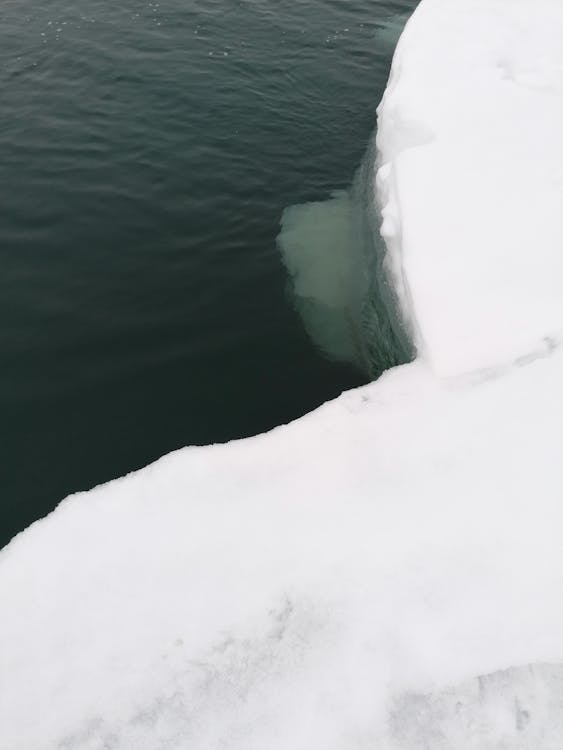 Free Iceberg on Body of Water Stock Photo