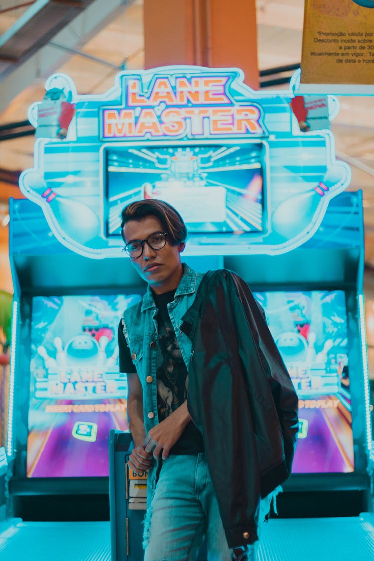 Stylish Ethnic Man In Eyeglasses Standing In Shopping Center