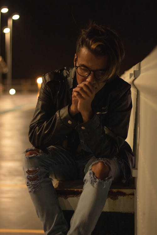 Photo Of Man Wearing Tattered Jeans 