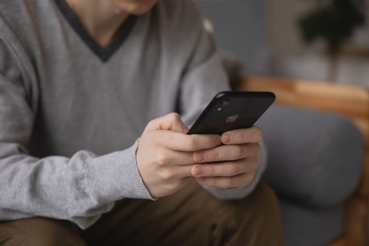 Member using his phone
