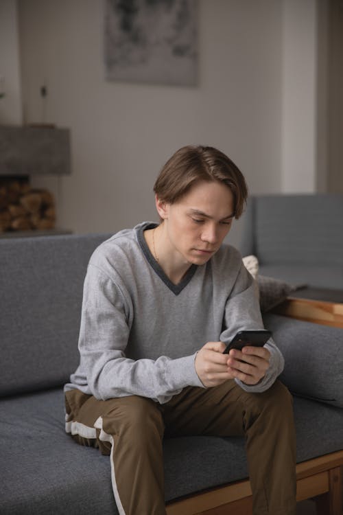 Free Photo Of Man Using Smartphone Stock Photo
