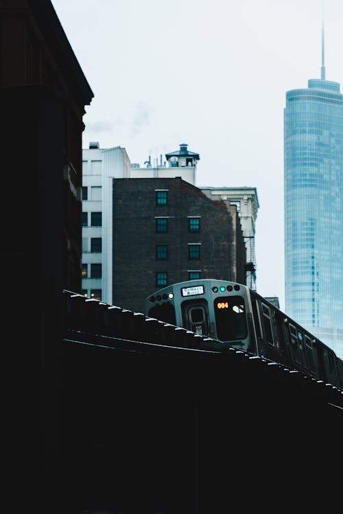 Train Between Buildings