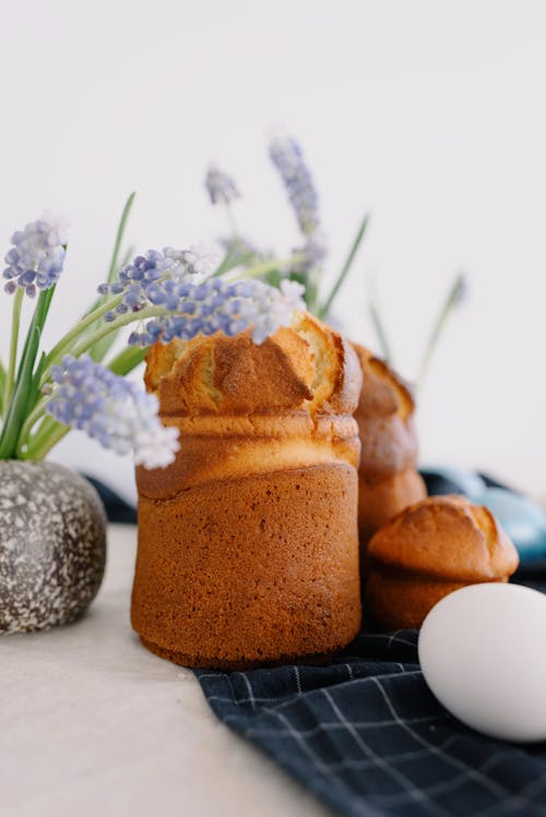 Photo Of Bread Beside Flowers