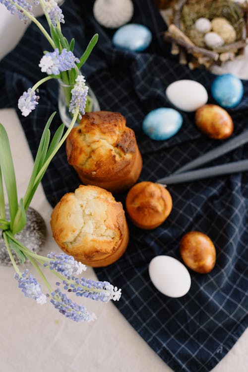 Photo Of Muffins Beside Flowers 