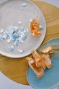 Broken Easter Egg Eggshells and Onion Skin on Ceramic Plates