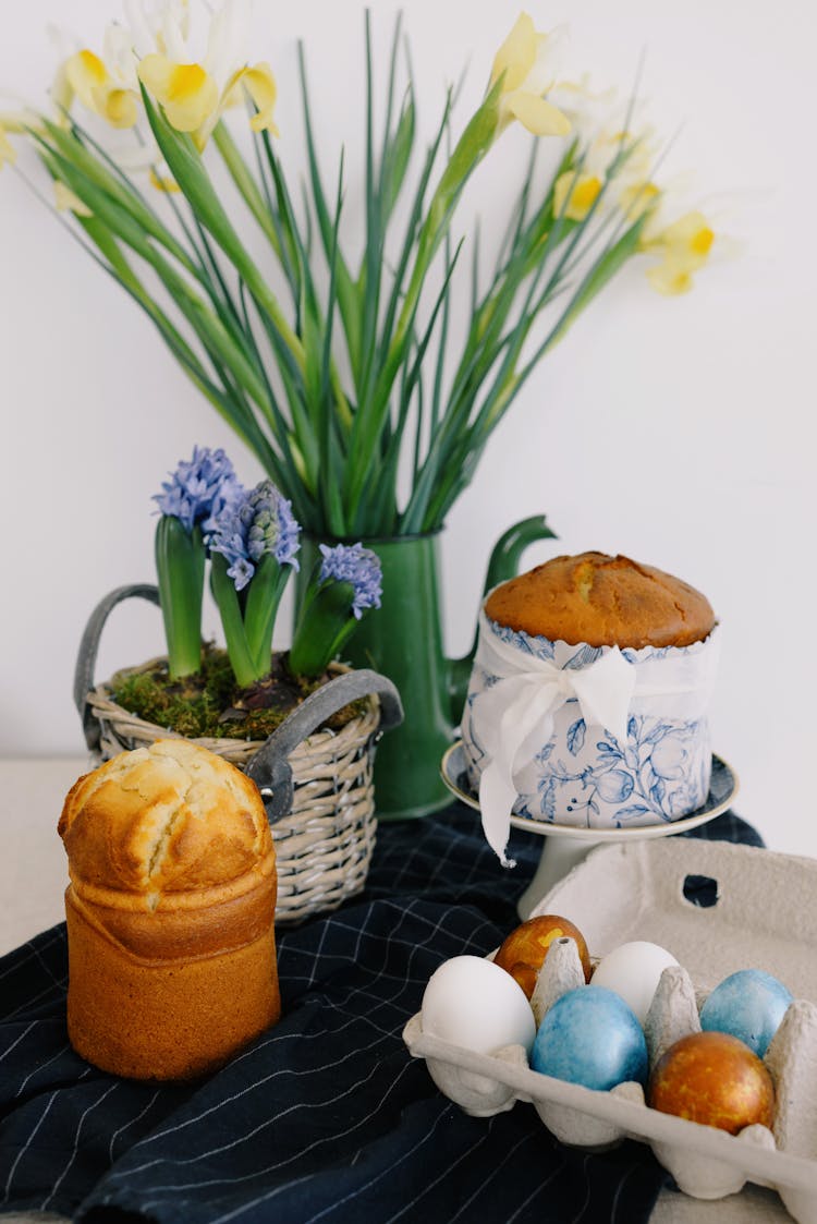 Table With Easter Eggs And Flowers