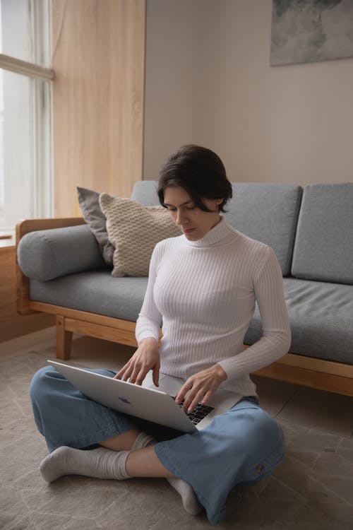 Photo Of Person Using Laptop