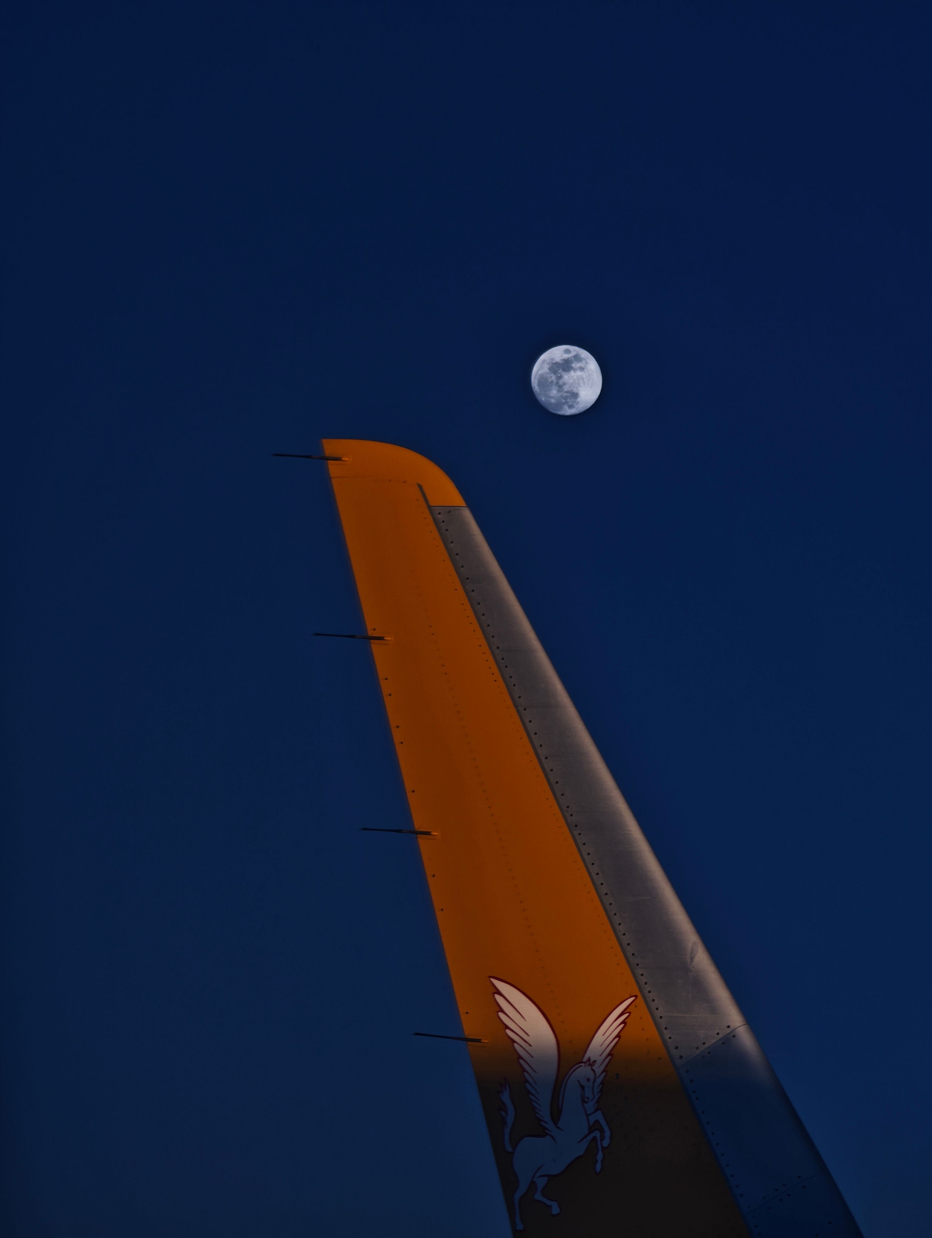 Airplane Wing with Moon in Twilight Sky · Free Stock Photo