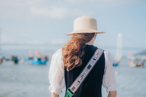 Selective Focus Photo Of Woman Wearing Straw Hat
