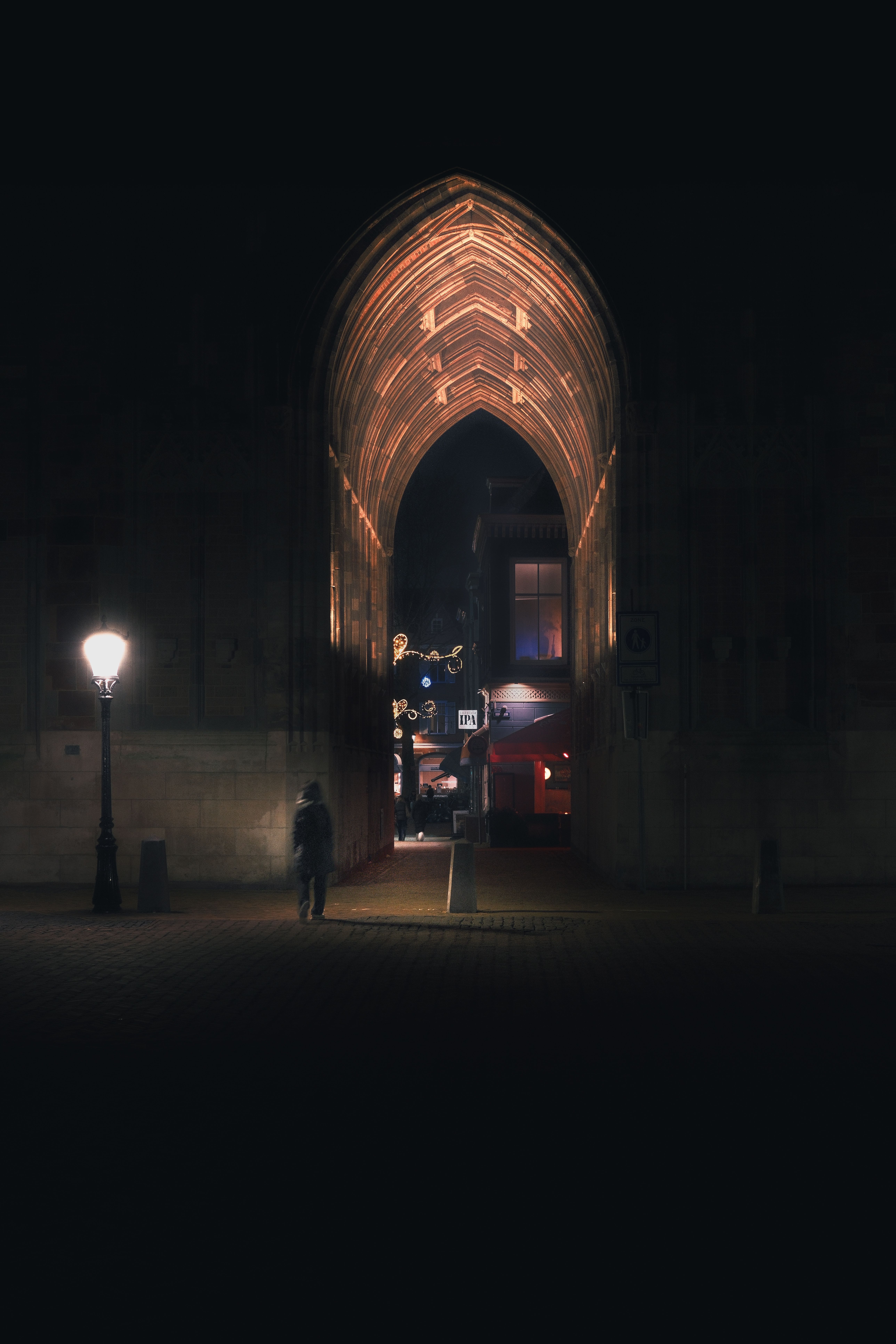 Gothic Archway Illuminated at Night · Free Stock Photo