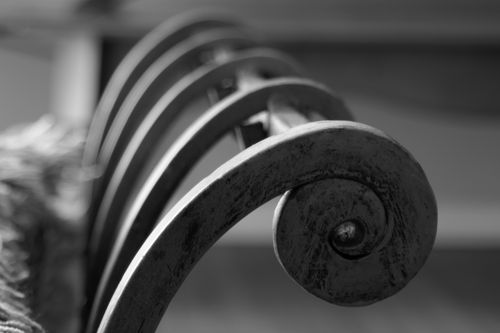 Free Artistic black and white photo of an ornate metal spiral providing texture and depth. Stock Photo
