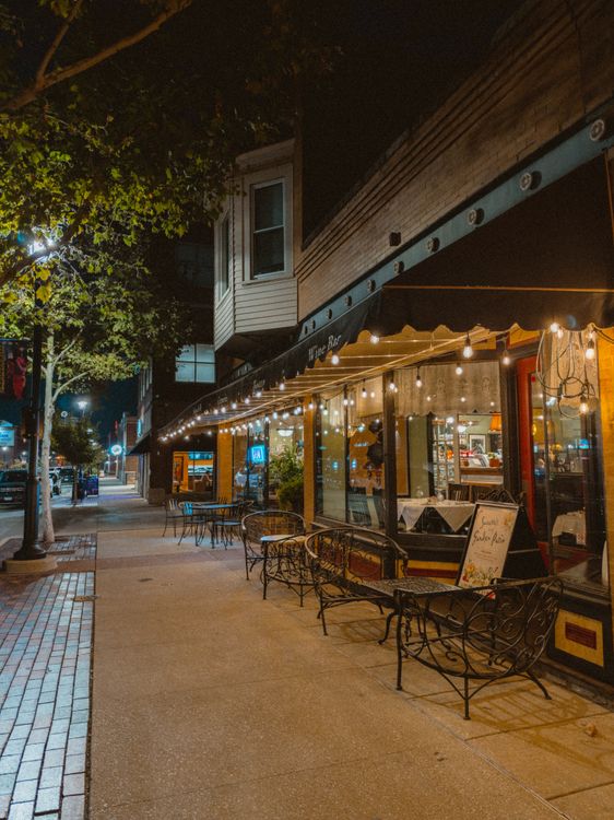Empty Cafwe Cozy Night Street Cafe with String Lights · Free Stock Photo