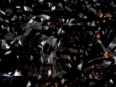An abstract pattern of metallic and reflective surfaces, creating a dynamic visual texture.
