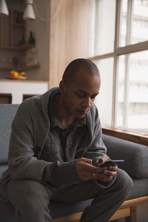 A Man Using Phone Insta Photo Of Man Using His Mobile Phone · Free Stock Photo