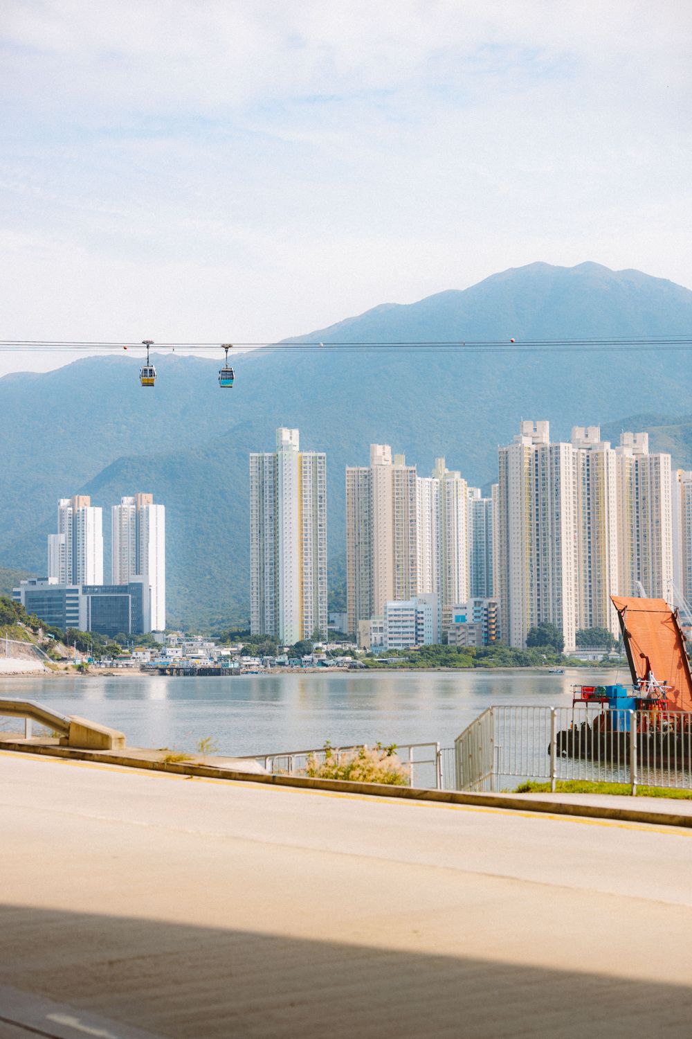 Free Water Graphics Modern City Skyline Overlooking Tranquil Water · Free Stock Photo