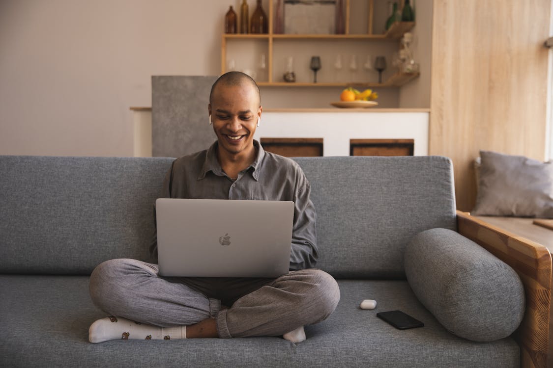 Photo Of Man Using Laptop