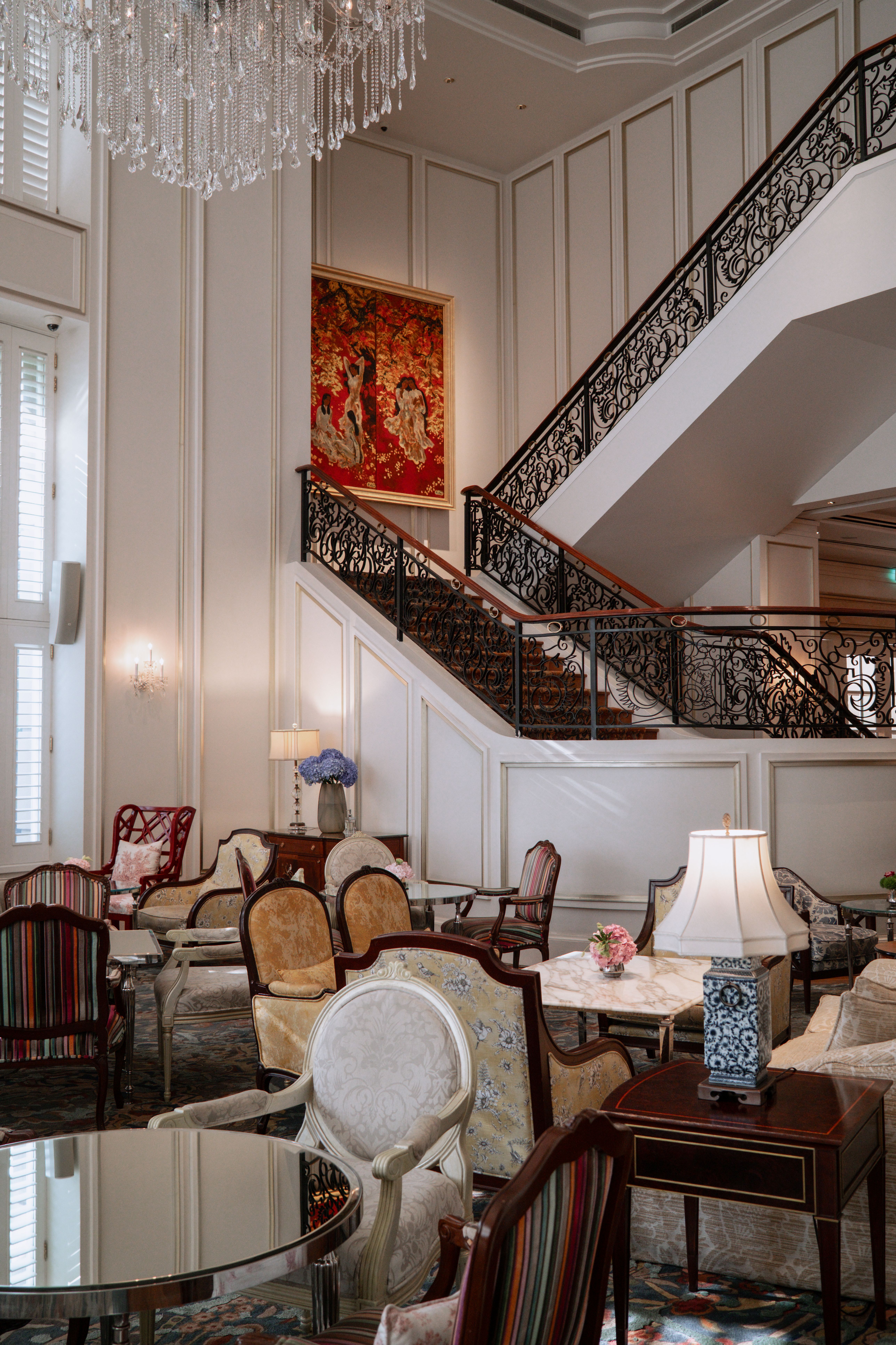 Elegant Hotel Interior with Grand Staircase · Free Stock Photo
