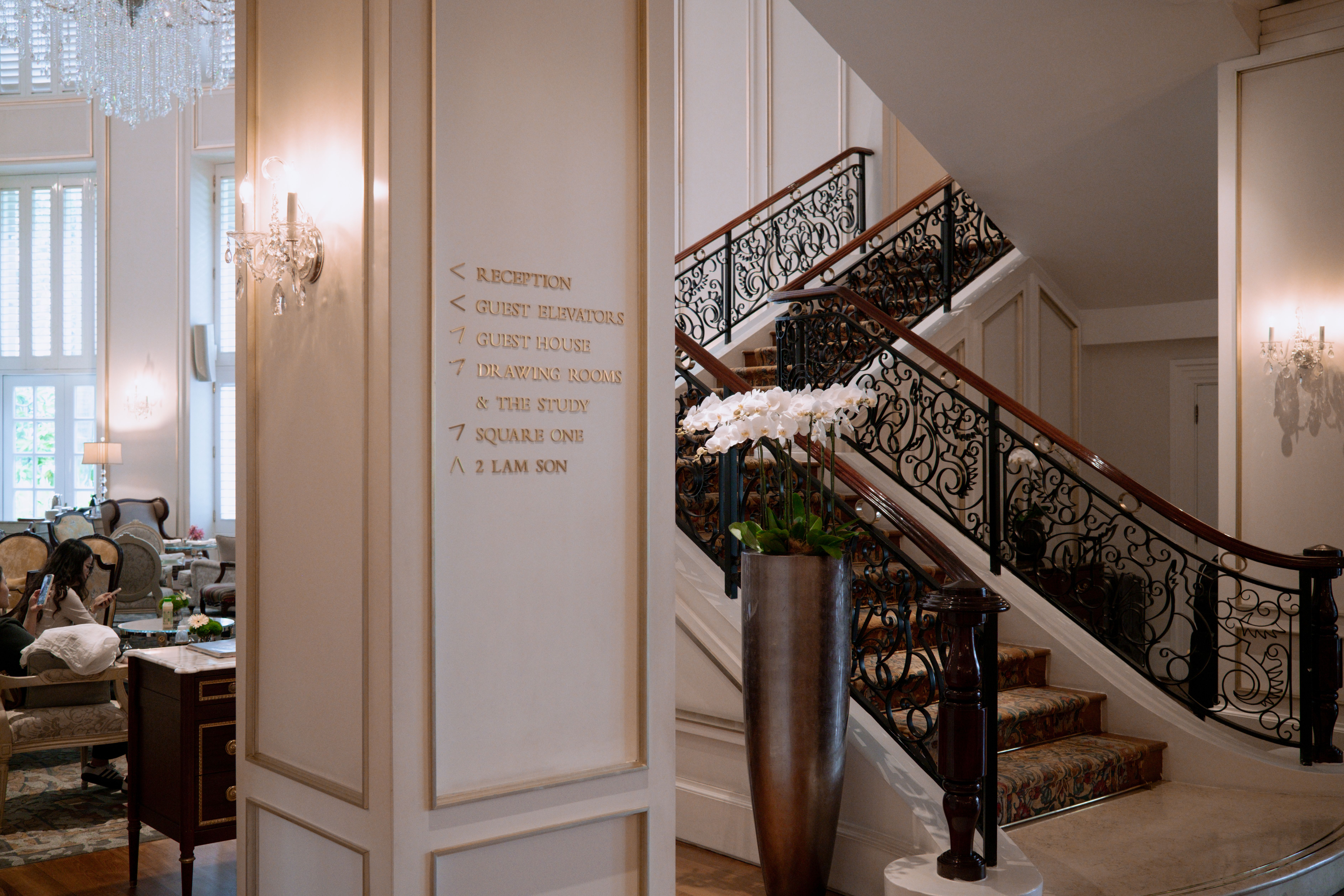 Elegant Hotel Lobby with Grand Staircase · Free Stock Photo