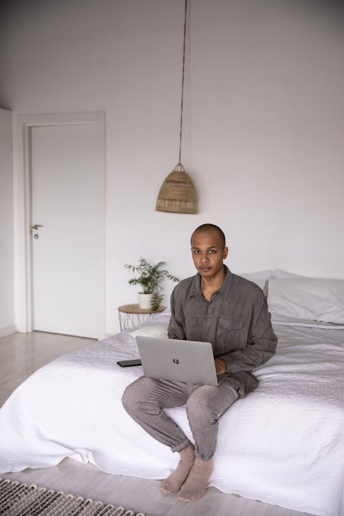Photo Of Man Using Laptop
