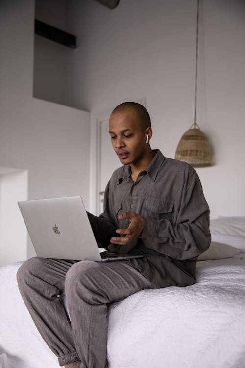 Photo Of Guy Using Laptop