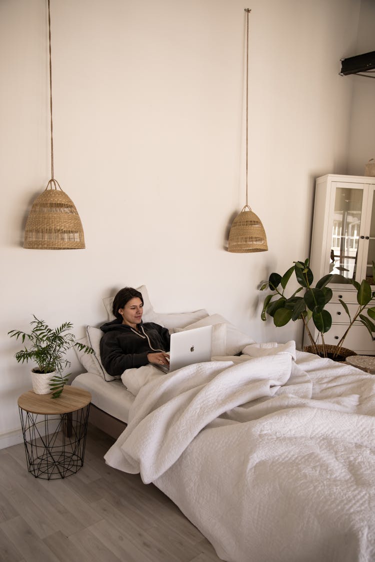 Photo Of Woman Laying On Bed