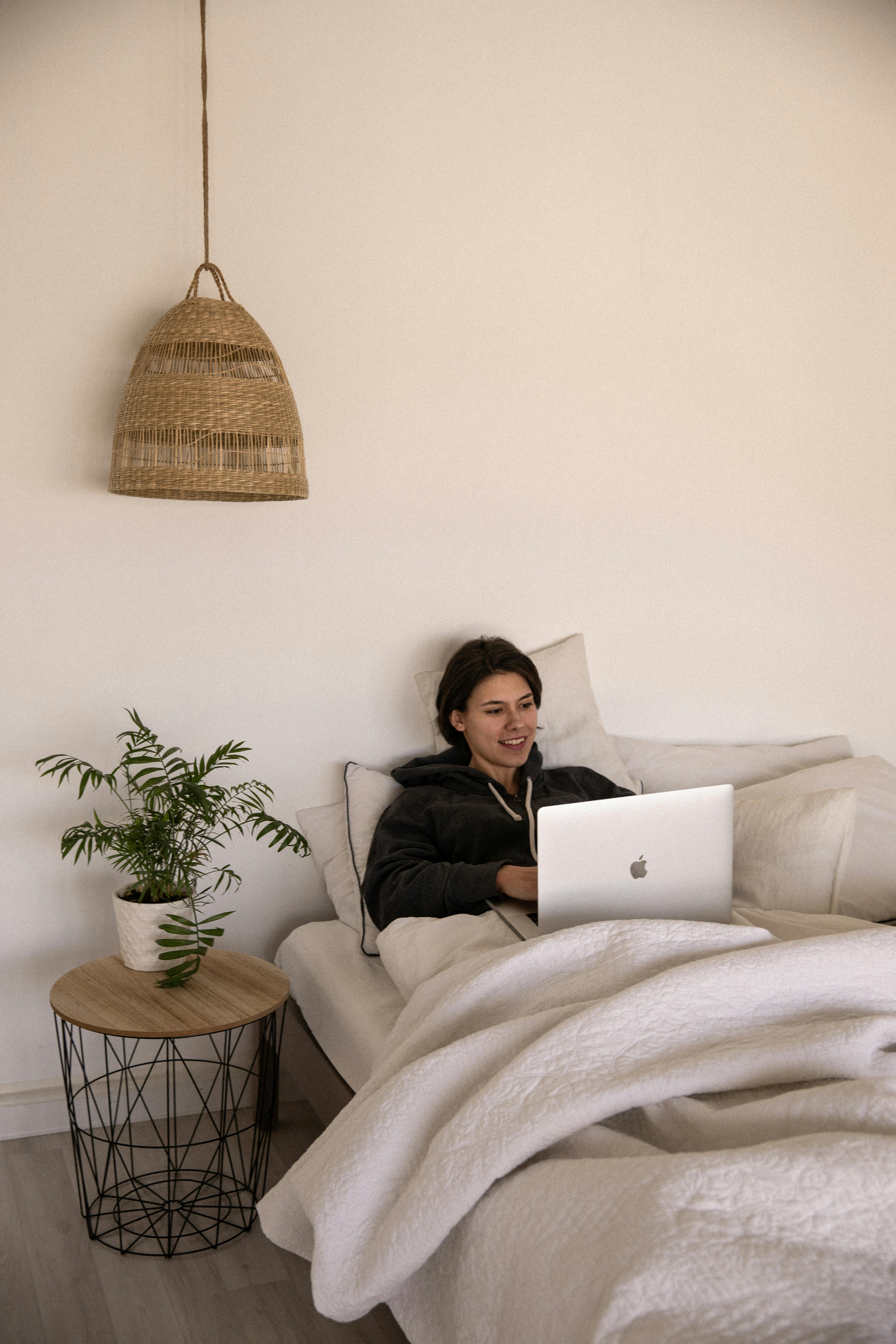 photo of woman using laptop