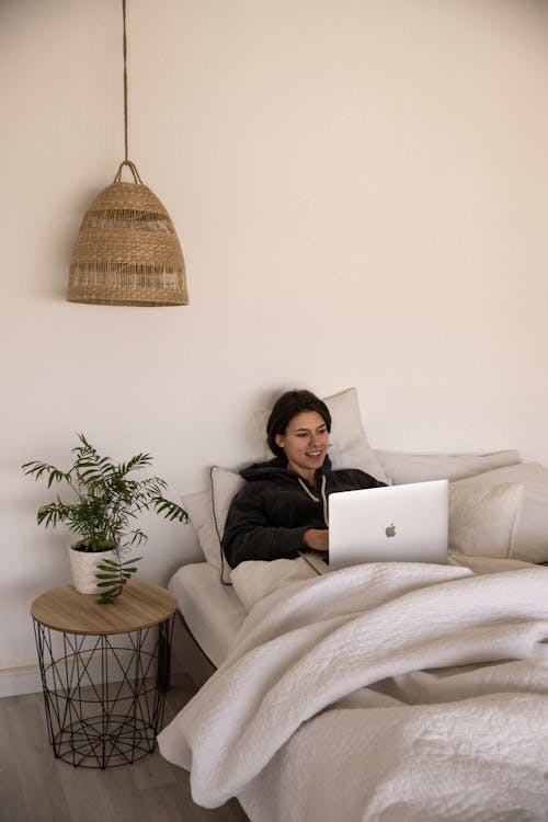 Free Photo Of Woman Using Laptop Stock Photo