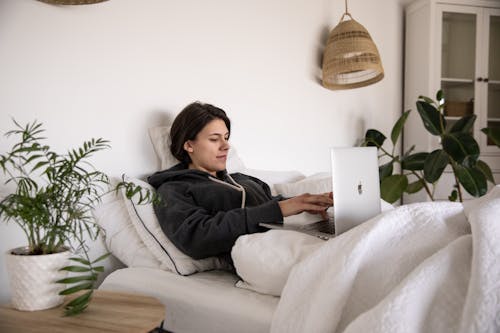 Photo Of Woman Laying On Bed