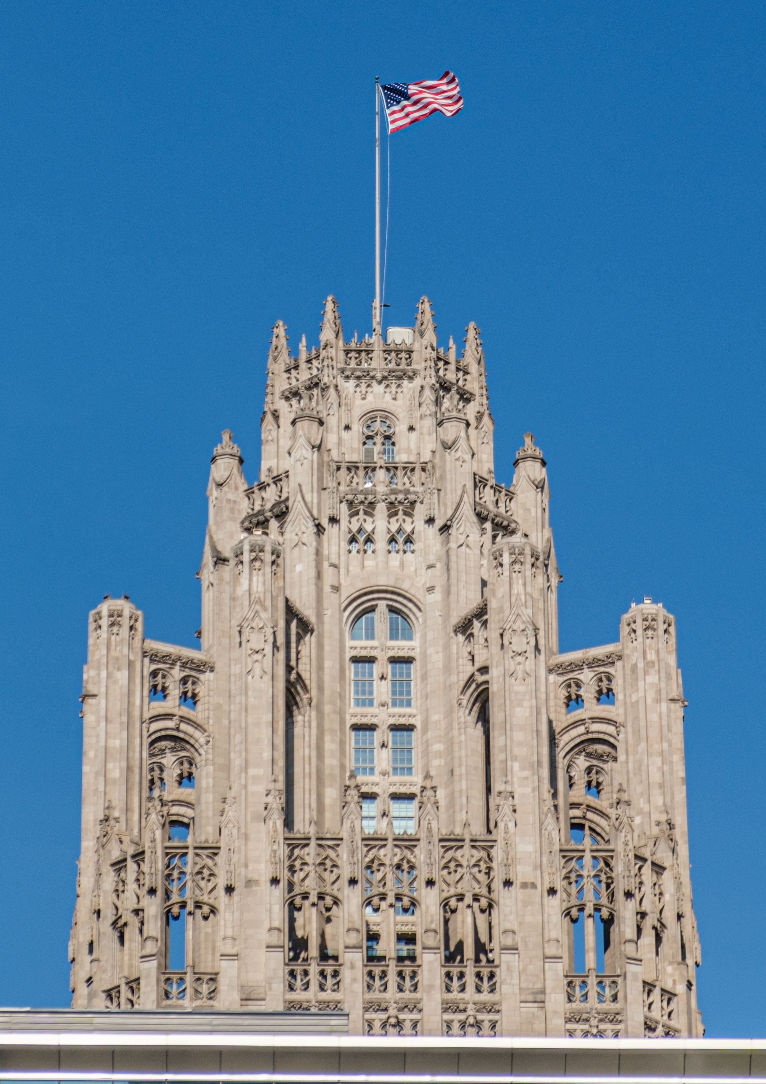 Gothic Skyscraper with American Flag · Free Stock Photo