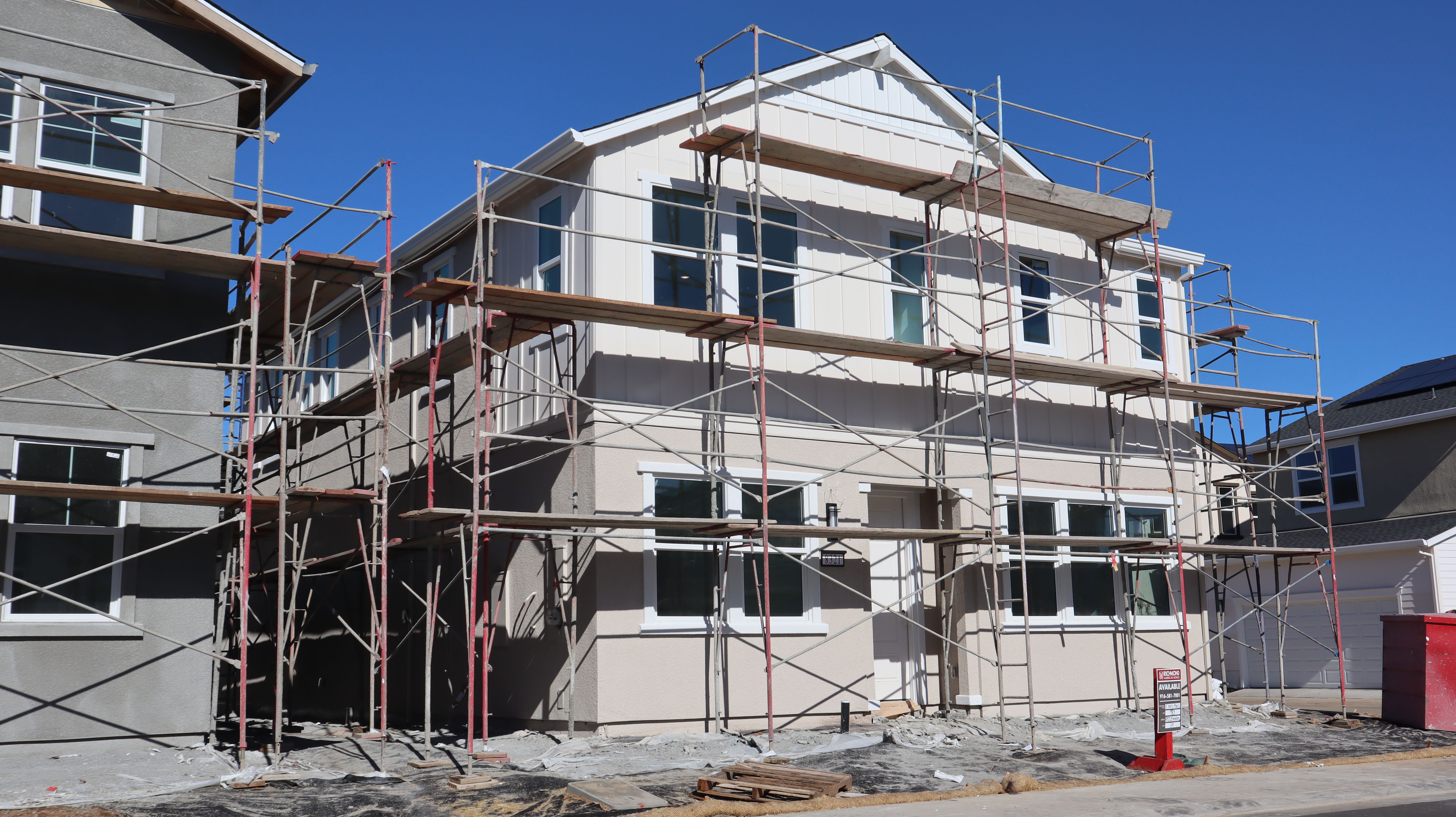 Modern Two-Story House Under Construction with Scaffolding · Free Stock ...