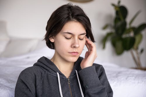 Free Close-Up Photo Of Woman Closing Her Eyes Stock Photo