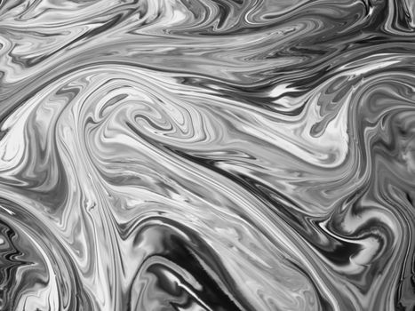 Black and white swirl pattern with fluid abstract design, ideal for artistic backgrounds.