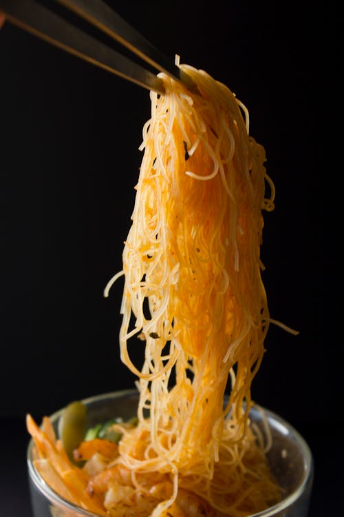 Free Yellow Pasta on Stainless Steel Bowl Stock Photo