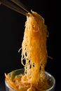 Yellow Pasta on Stainless Steel Bowl