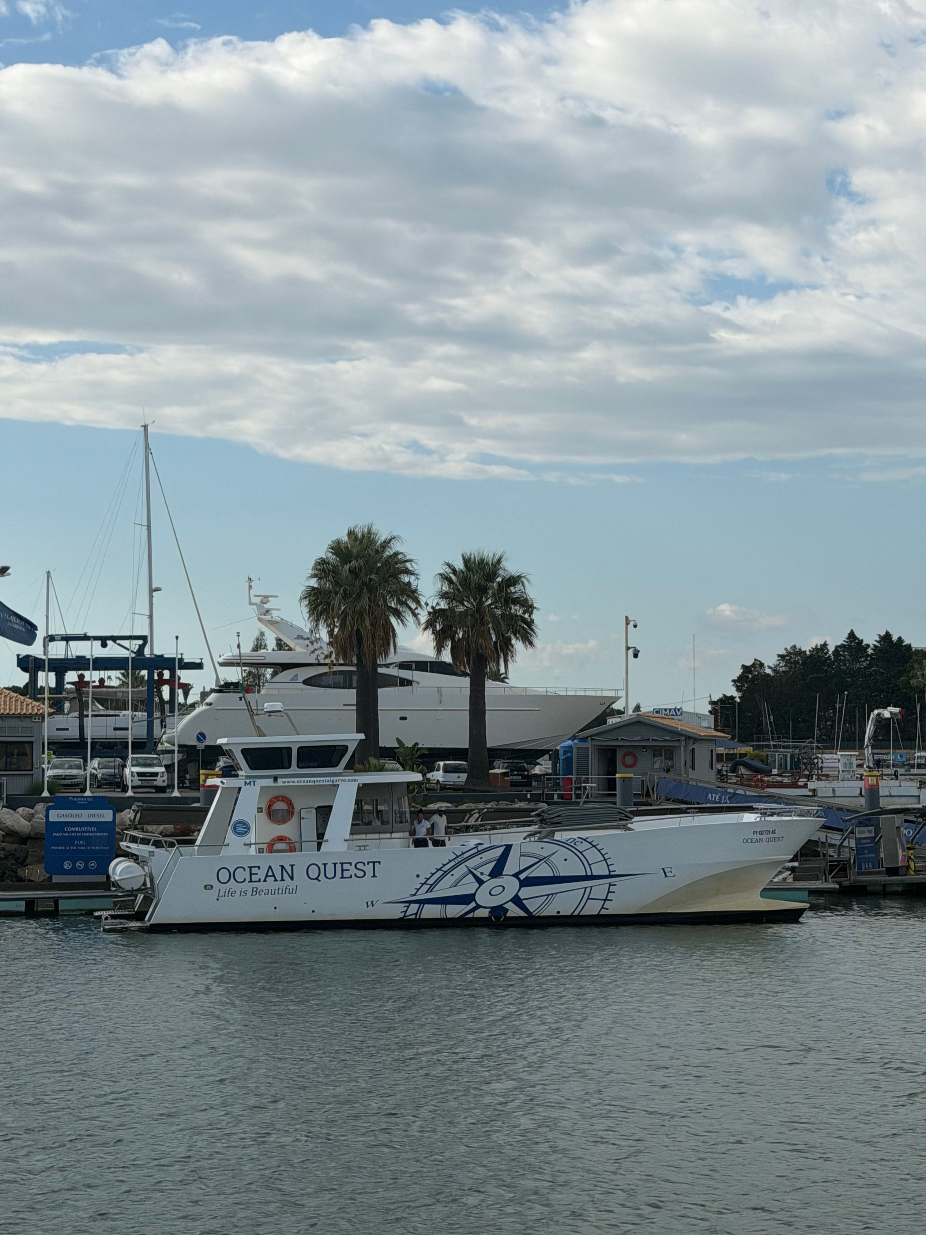 Ocean Quest Boat Docked at Marina in Albufeira · Free Stock Photo
