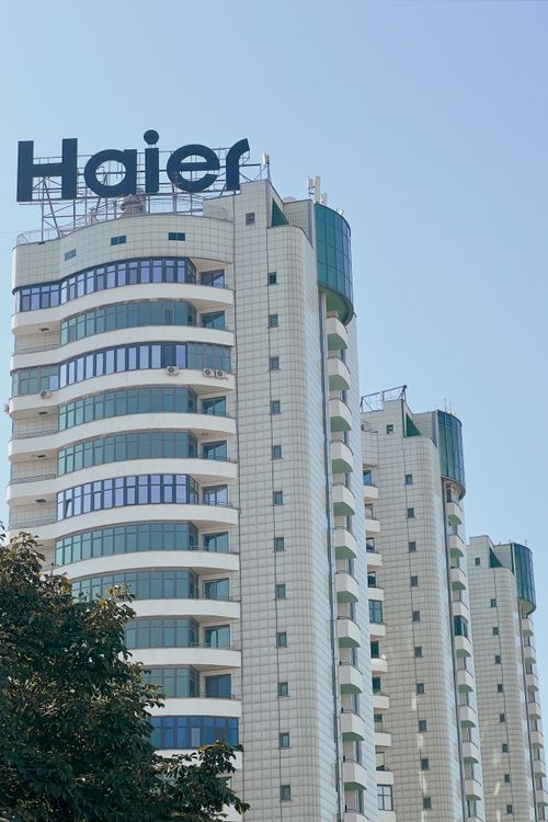 Free High-rise building with Haier logo in Almaty, Kazakhstan, showcasing modern architecture. Stock Photo