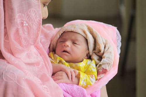 Free Baby in Pink and White Blanket Stock Photo