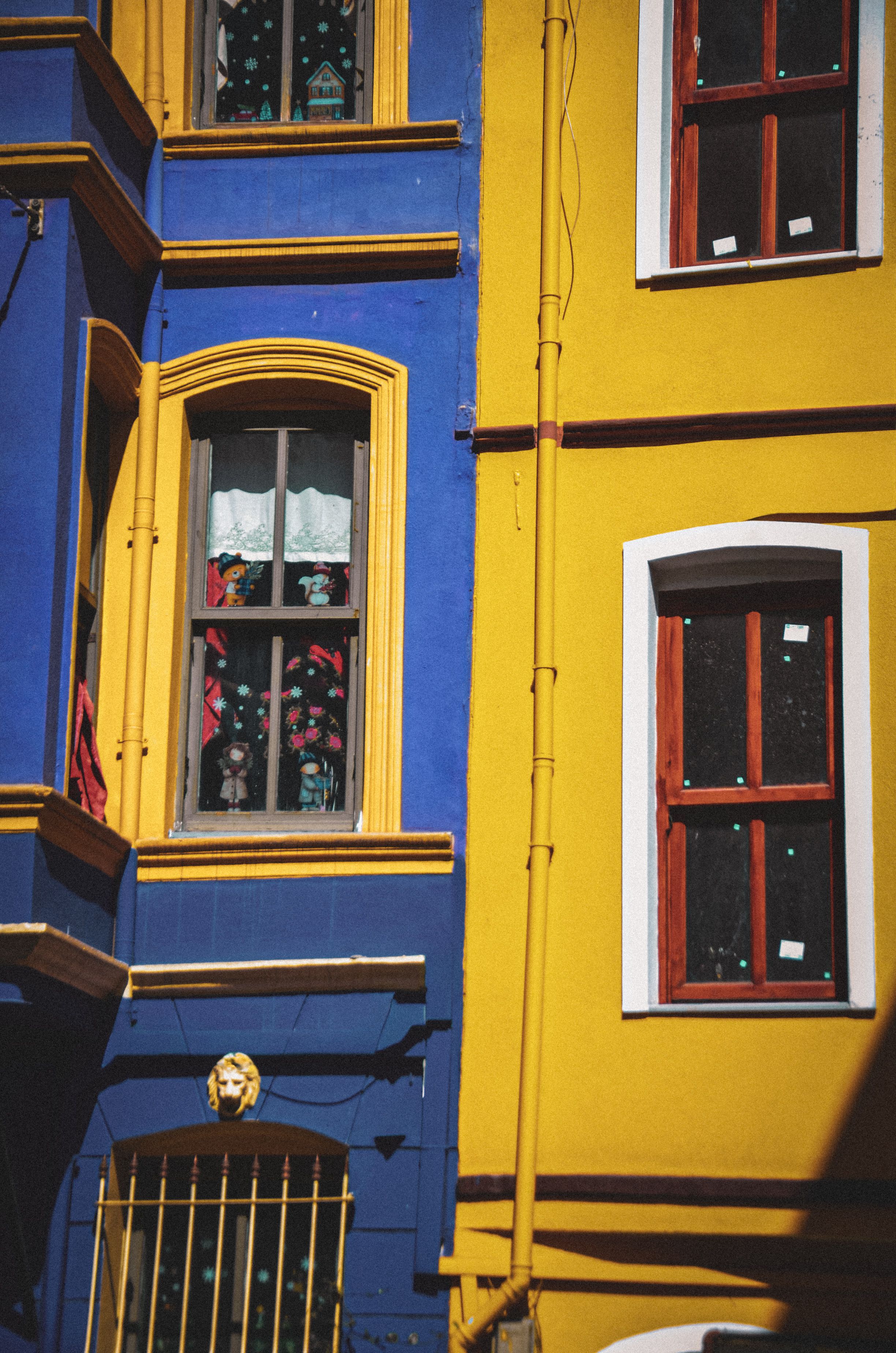 Colorful Urban Architecture with Blue and Yellow Facade · Free Stock Photo