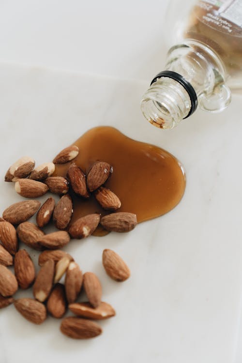 Close-Up Photo Of Almonds With Maple Syrup